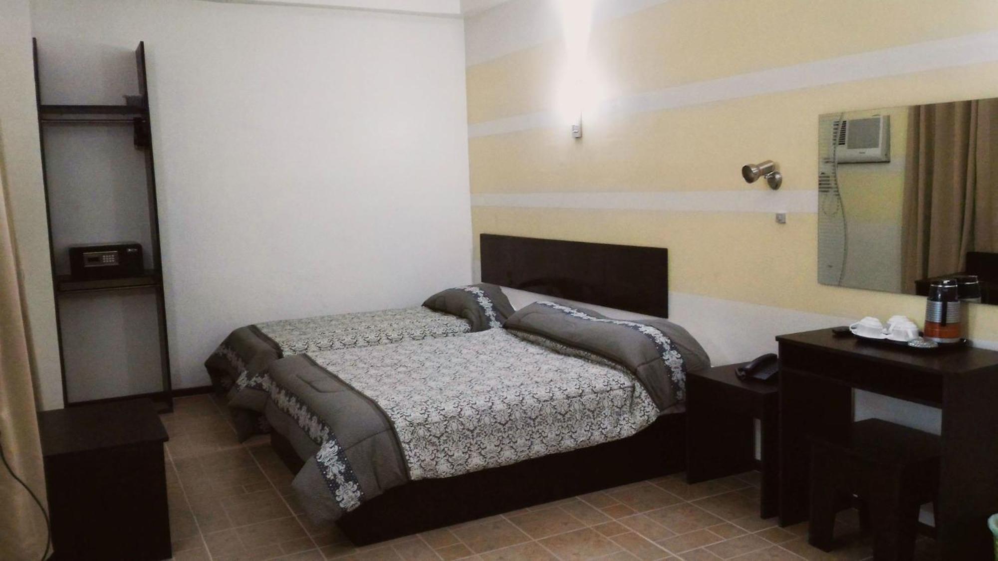 Metro Park Hotel Mandaue Cebu Stadt Zimmer foto