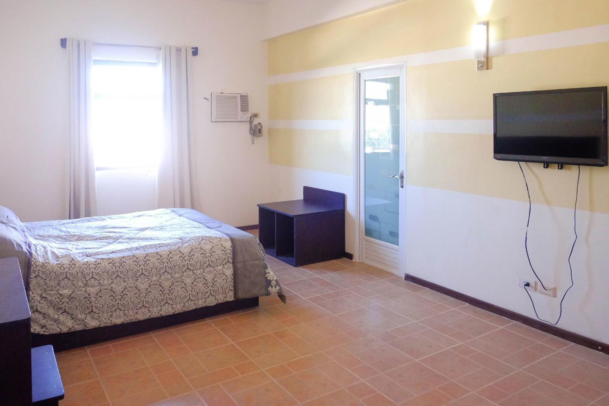 Metro Park Hotel Mandaue Cebu Stadt Zimmer foto
